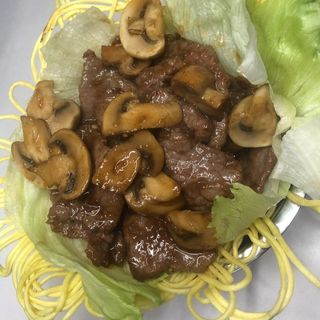 Ternera con champiñones