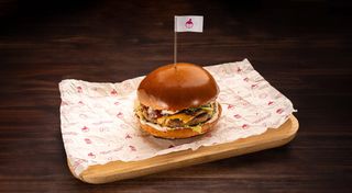 Бургер зі свининою та зеленню