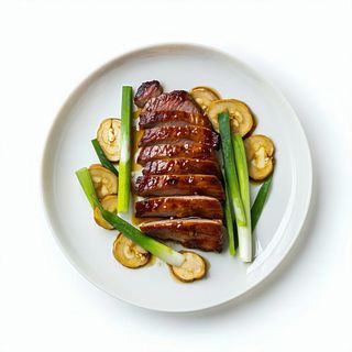 135 Anatra con zenzero e cipolline