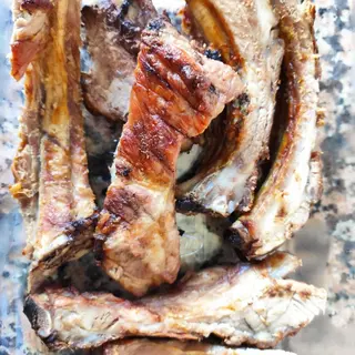 Churrasco De Cerdo Con Patatas Y Ensalada