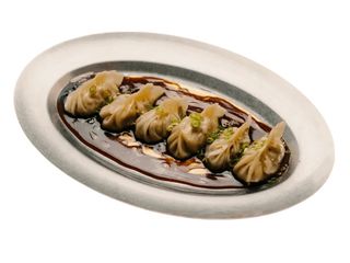 Dumplings з качкою конфі та соусом хойсін