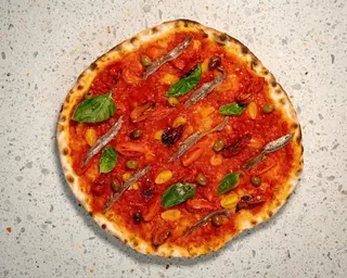 Quattro pomodori e alici