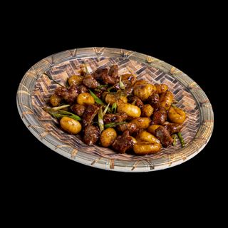 Lagarto ibérico al wok estilo chifa