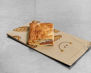 Porción De Empanada De Chorizo