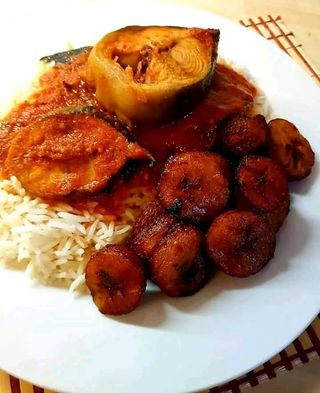 White Rice with Stew , Plantain and Fish