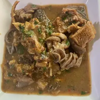 Assorted Goat Meat White Soup With Eba