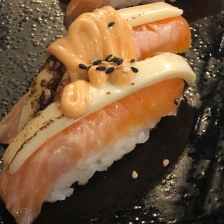50. Nigiri sake cheese fire