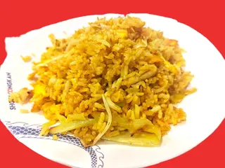 25. Arroz Frito Al Curry Con Pollo