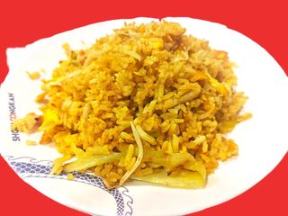 25. Arroz Frito Al Curry Con Pollo