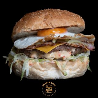 Hamburger di manzo Τονυ Μοντανα con patatine e salsa a scelta