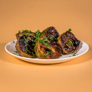 Картопля у часниковому соусі (300г)