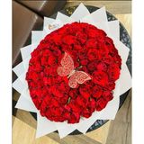 Red roses hands bouquet
