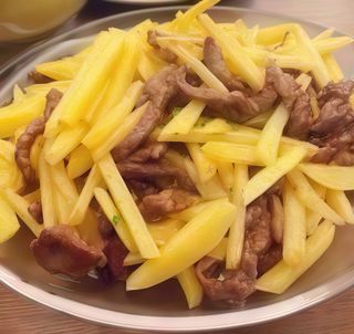 70.Ternera con patata frita