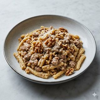 Rustiche con ragù bianco e noci