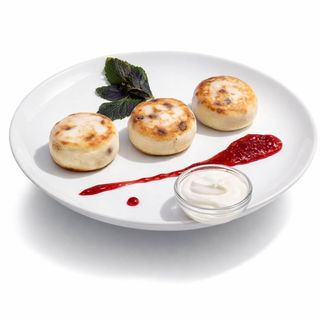 Сирники з ягідним соусом