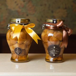 BABA' MIGNON IN BARATTOLO (rum o limoncello)