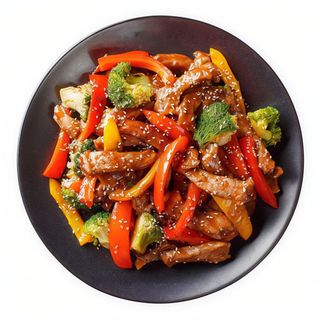 Cordero al wok con teppanyaki