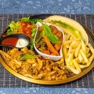 Émincé de poulet champignons