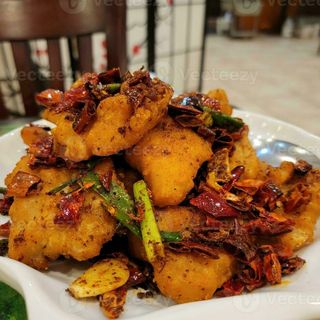 Pescado Con Salsa Picante