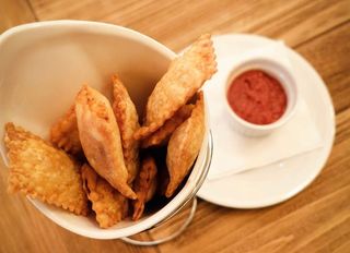 Raviolis Crujientes de Panceta ahumada (Ración)