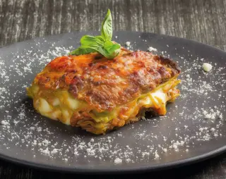 Lasagna di Ragú di carrillera de cerdo