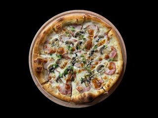 Піца шинка та гриби