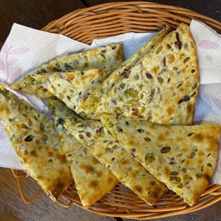 95. Onion kulcha ( contiene gluten)