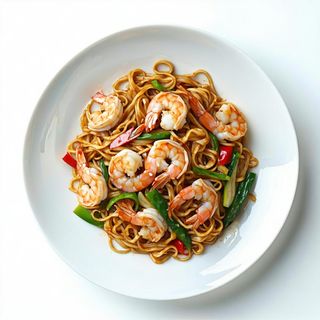 Noodles saltati con gamberi e verdure