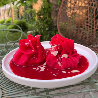 Crepes with strawberry sauce