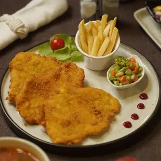 Plat Escalope de poulet pané