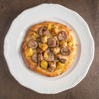 Salsiccia e patate al forno