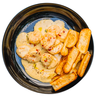 CREVETI BALTITI IN UNT SERVITI CU PITA COAPTA 300/80 g