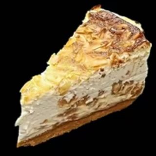Tarta de queso y turrón casera (porción)