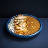 Arroz Con Curry Y Chuleta De Pollo