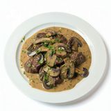 55. Ternera con Champiñones