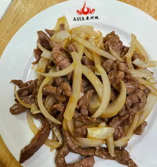 67. Ternera Con Cebolla