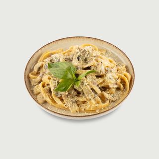 Паста із грибами та соусом з трюфелем