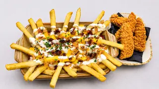 Double cheese deluxe strips fries