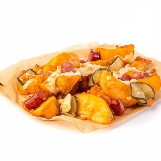 Картопляні дольки з ковбасками (210/30/20г)