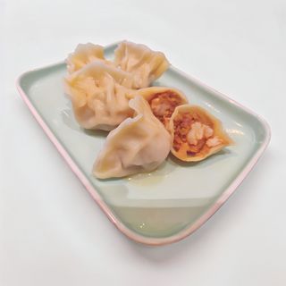 Ravioli di gamberi e maiale