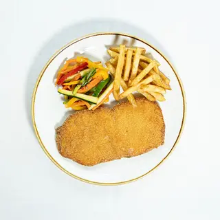 Milanesa de secreto ibérico con huevos fritos, parmesano recién rallado