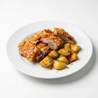 Cochinillo frito con patatas