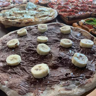 Pizza  Mediana Nutella Con Naranja Y Limoncello (30 Cm.)
