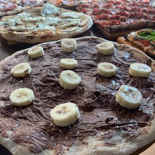 Pizza  Mediana Nutella Con Naranja Y Limoncello (30 Cm.)