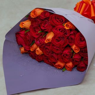 40pcs of red and orange bouquet mixed with  white gypsophilas 