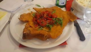 Cotoletta alla primavera con rucola e pomodorini