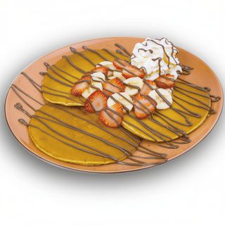 Tortitas Con Nutella, fresas, plátano y nata montada