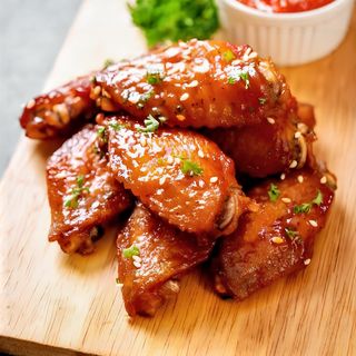 Ración De Alitas De Pollo Empanadas (12 Uds.)