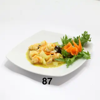 87. Gamberi al curry