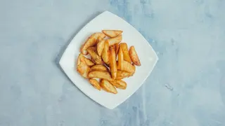 Začinjeni krompirići 180g
